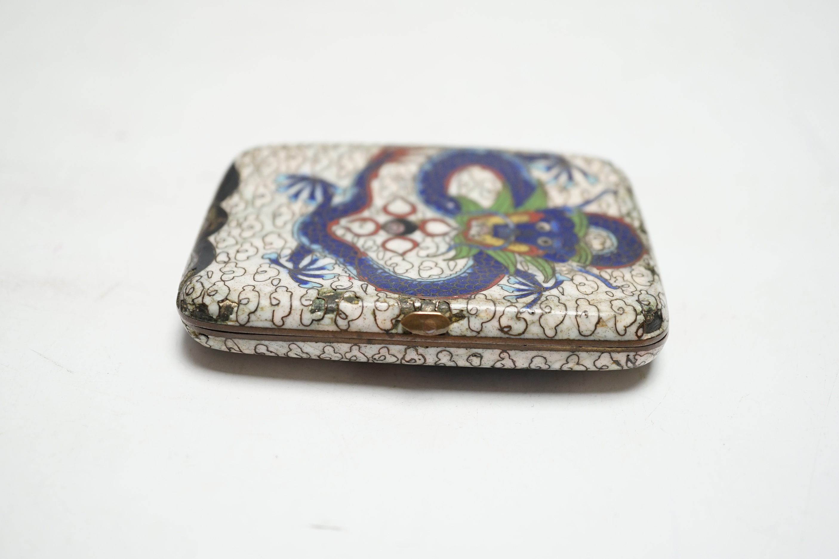 A Chinese cloisonné enamel ‘dragon’ design cigarette case, 9cm wide x 7cm deep